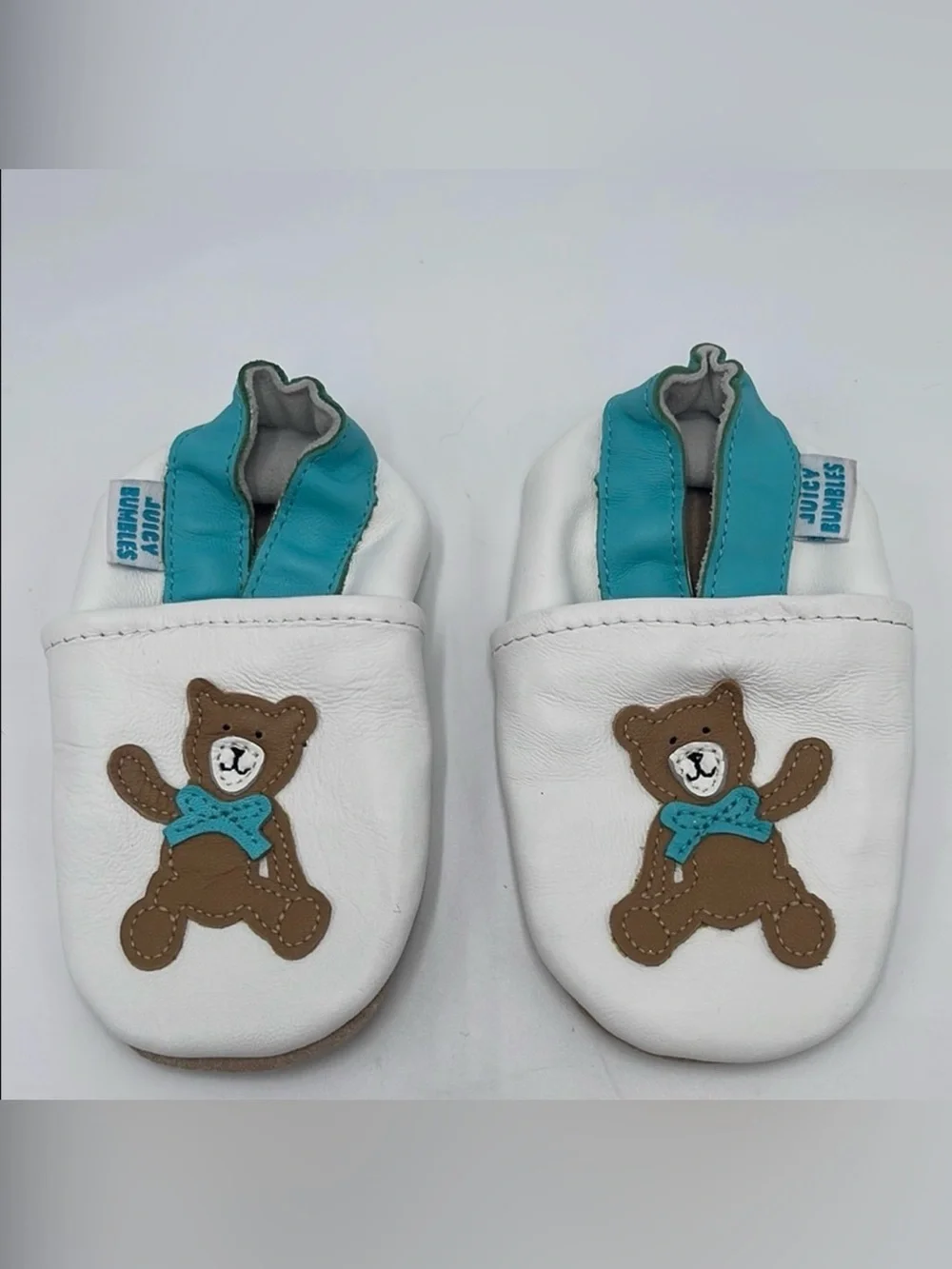 Soft Leather Juicy Bumbles Baby Sleepers White with Turquoise Band & Bear Design